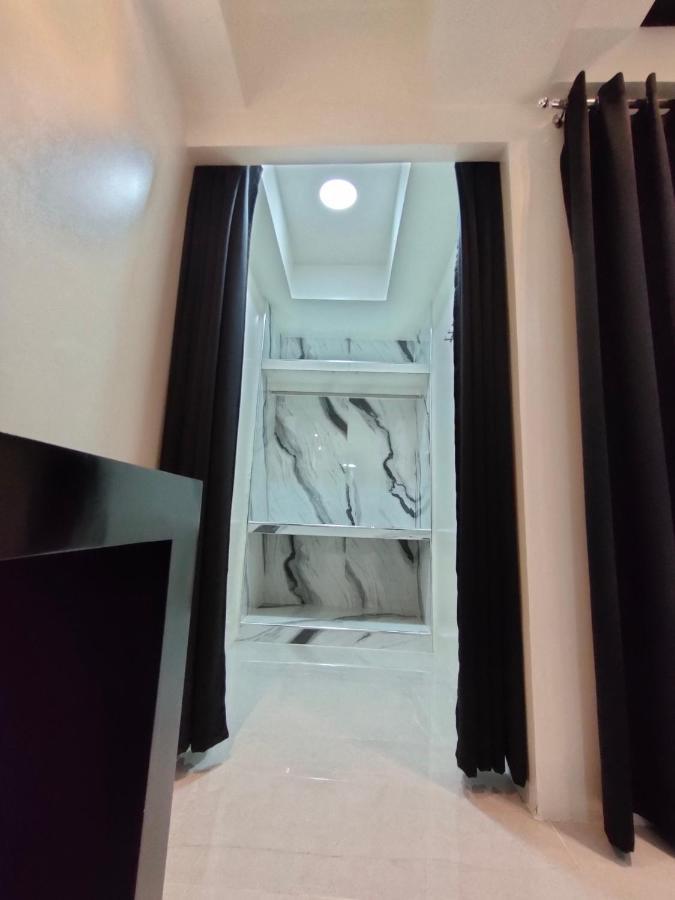 Burgundy Mckinley Place Service Apartment 马尼拉 外观 照片