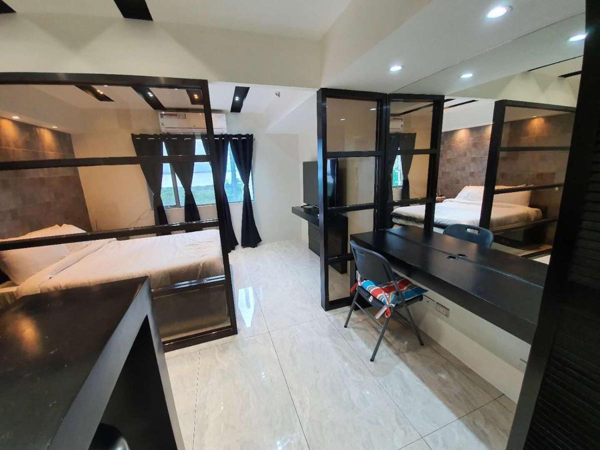 Burgundy Mckinley Place Service Apartment 马尼拉 外观 照片