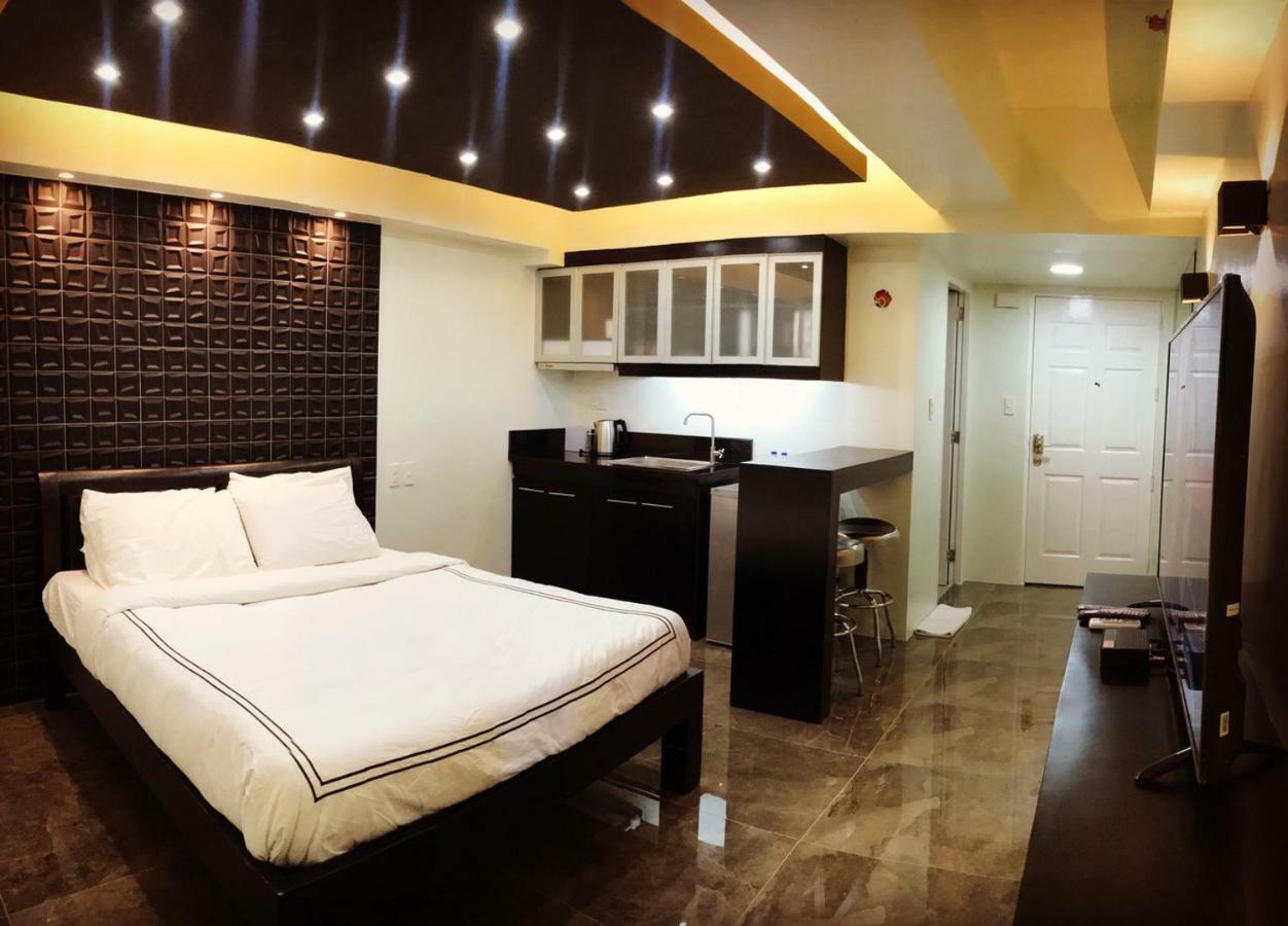 Burgundy Mckinley Place Service Apartment 马尼拉 外观 照片
