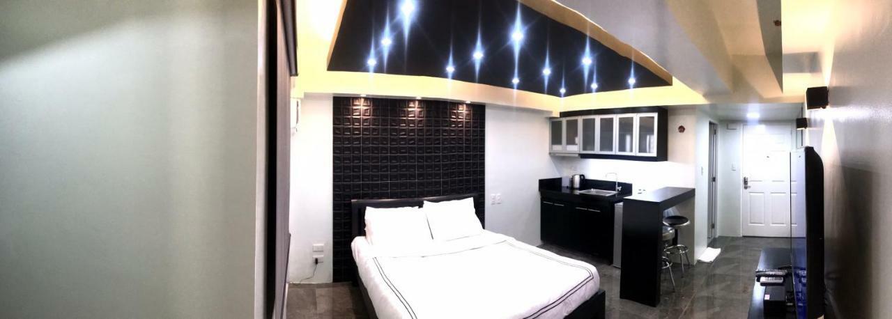 Burgundy Mckinley Place Service Apartment 马尼拉 外观 照片